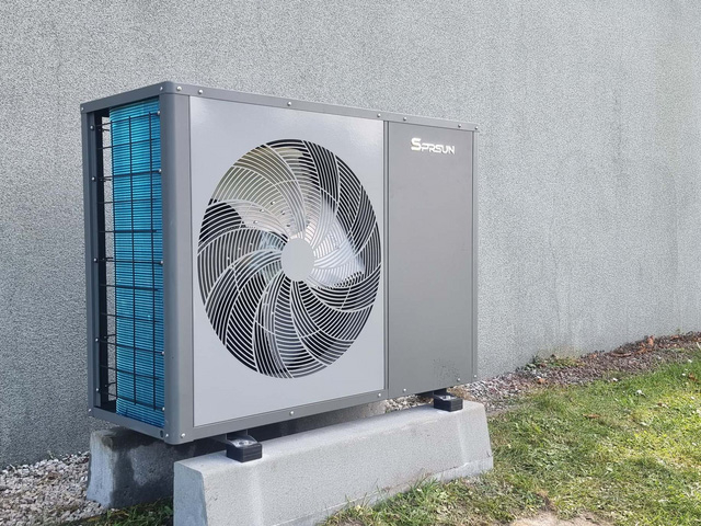 SPRSUN R32 heat pump outside the house